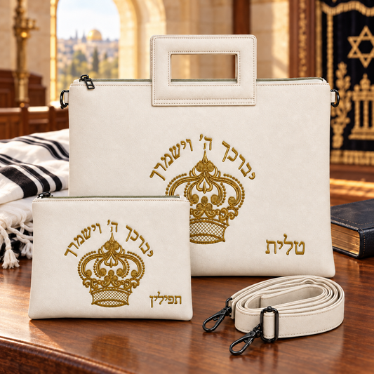 Ivory tallit and tefillin bag set with gold embroidery and shoulder strap in a synagogue setting