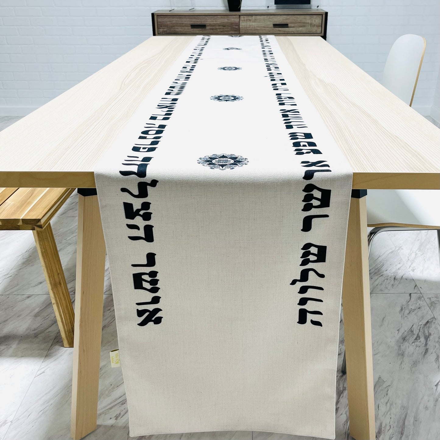 Black Brachot Tablerunner brings in all the Brachot to your Home