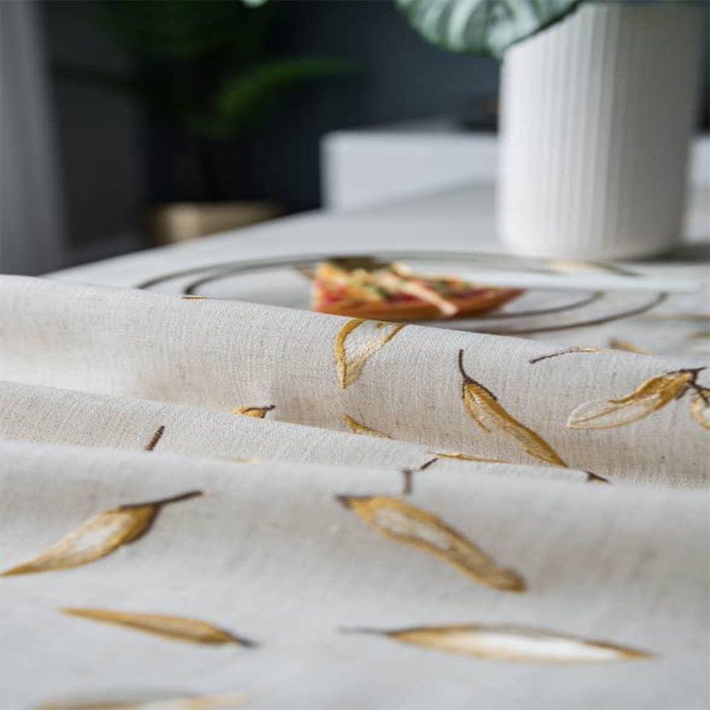 Gold leaves embroidered on beautiful soft waterproof linen. + 2 Matching pillowcases.
