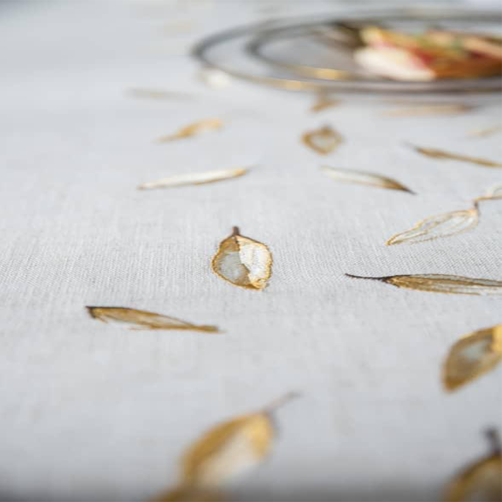 Gold leaves embroidered on beautiful soft waterproof linen. + 2 Matching pillowcases.