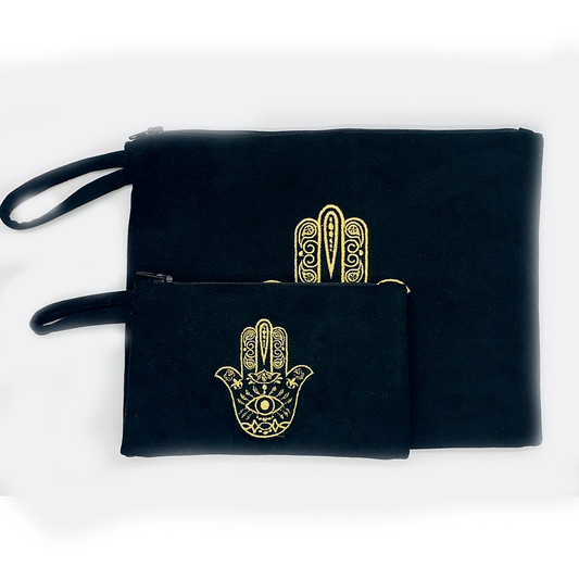 Embroidered hamsa Suede black or white bag zipper closure. Satin lining.