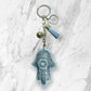 Soft puffy hamsa keychain with glitter stones 7.5cm