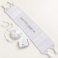 All-white baby Brit Milah set with mini tallit, baby kippah, and Tehillim book