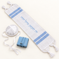 White and blue baby Brit Milah set with mini tallit, baby kippah, and Tehillim book