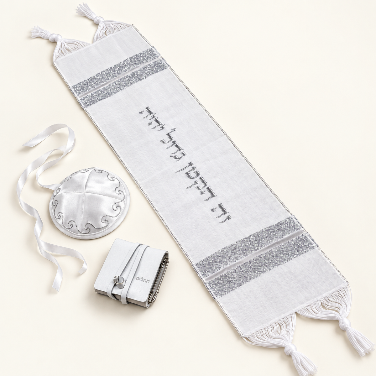 White and silver baby Brit Milah set with mini tallit, baby kippah, and Tehillim book