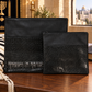 Black vinyl tallit and tefillin bag set in an elegant Jewish prayer setting