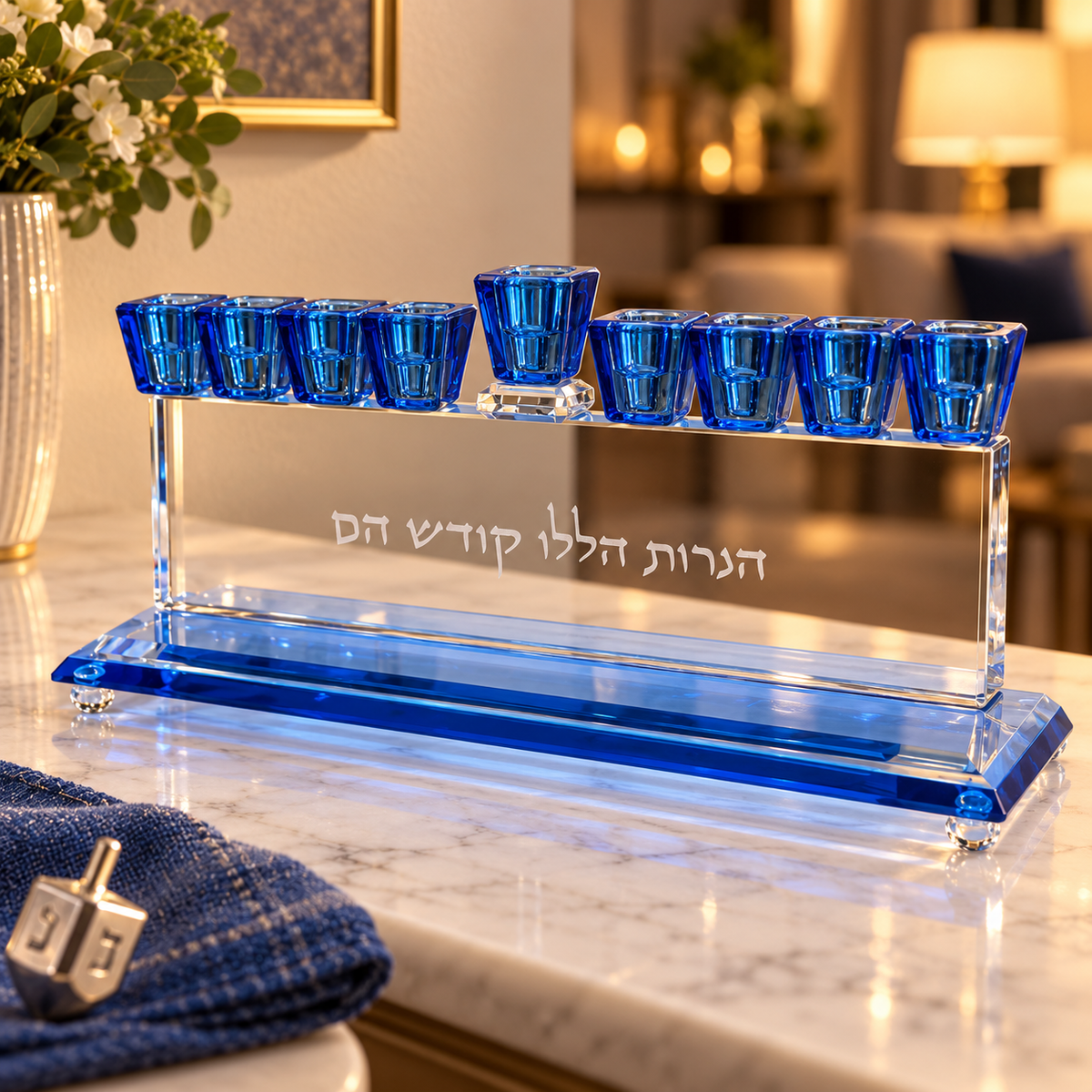 Blue crystal Hanukkah menorah displayed on a marble console in a warm home setting