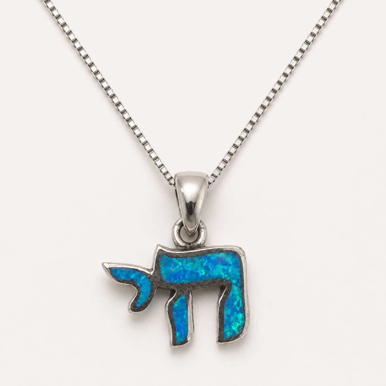 Women's sterling silver blue opal Chai necklace made in Israel