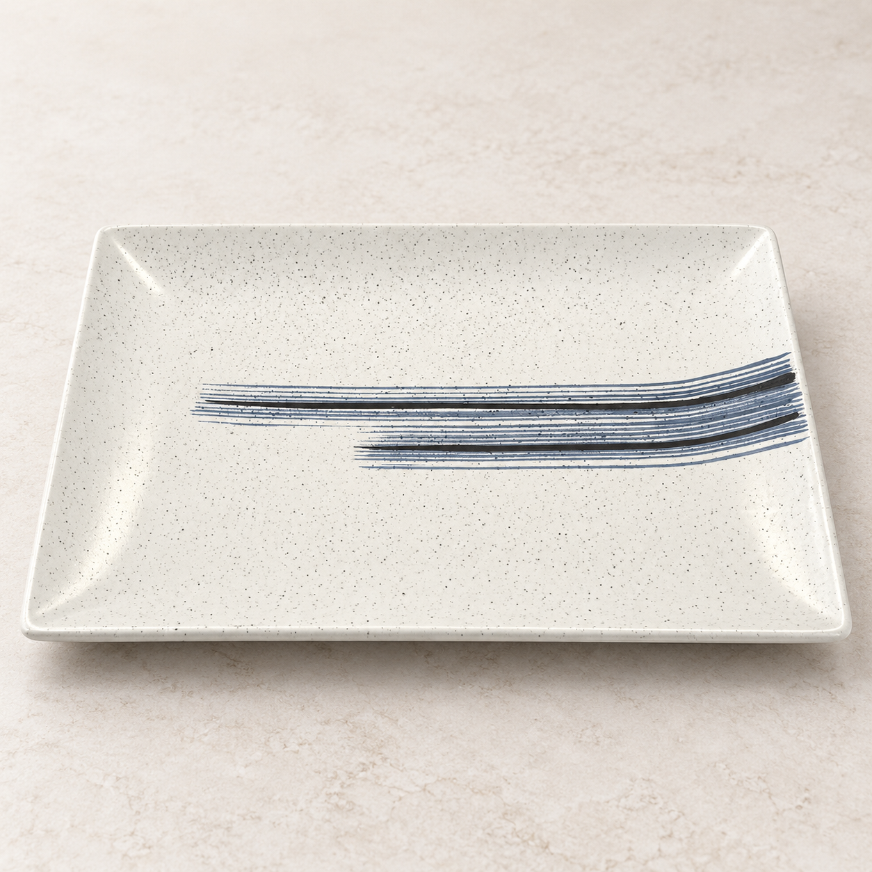 Ivory speckled ceramic serving platter with blue and black brushstroke design