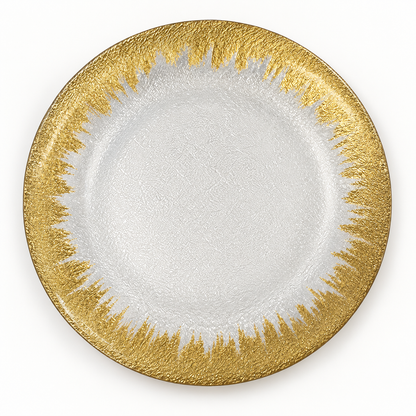 Clear glass serving plate with gold brushstroke border on a white background