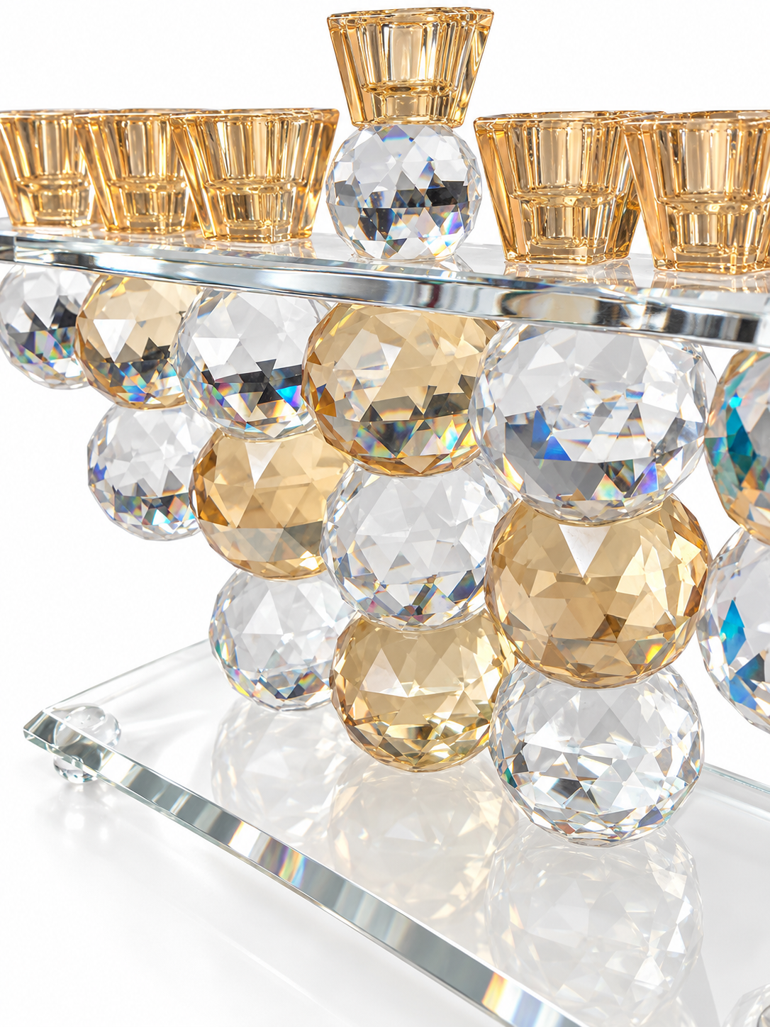 Close-up of the crystal menorah's clear and champagne faceted spheres