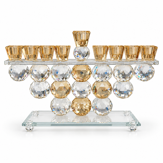 Crystal menorah with amber oil-cup holders and faceted clear and champagne spheres, front view