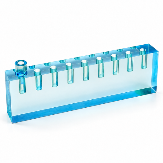 Blue lucite oil menorah with nine oil holders on a clean white background