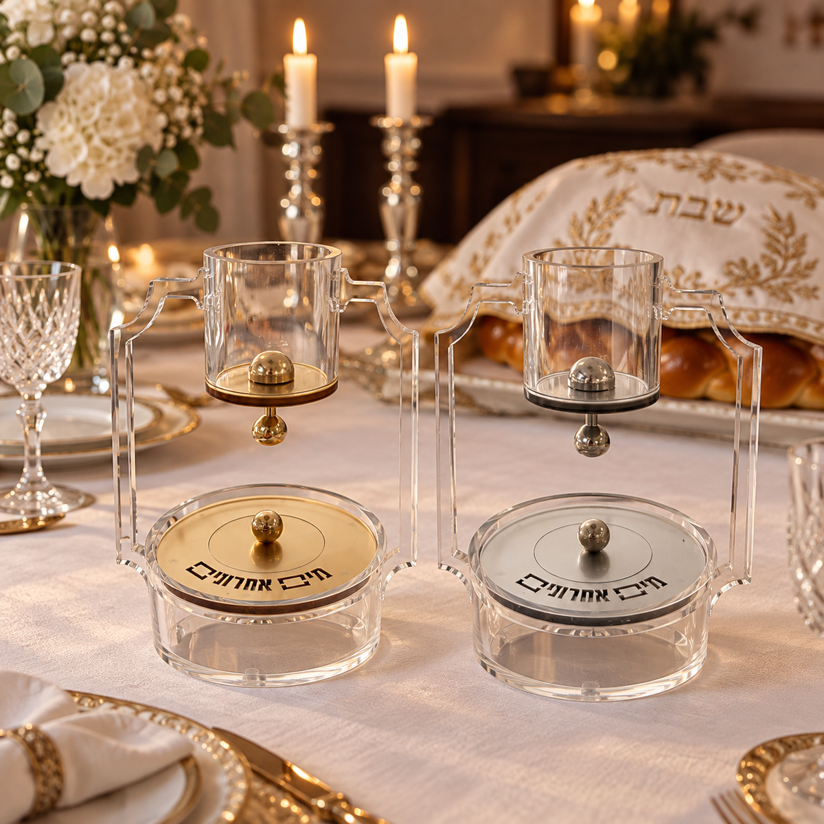 Gold and silver lucite mayim acharonim sets on an elegant Shabbat table