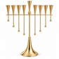Gold-tone menorah for oil cups with nine tapered holders and eight hanging ball details, front view