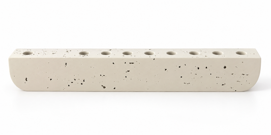 Ivory textured concrete hanukkiah with nine recessed holders, front view