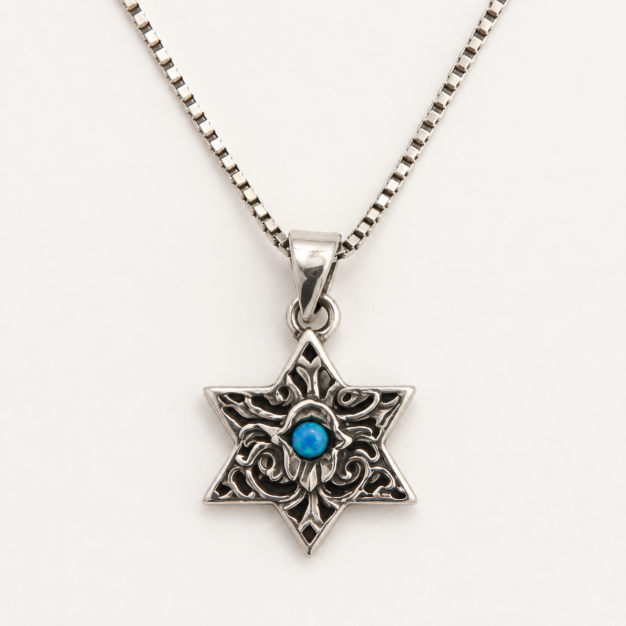 Women's ornate Star of David sterling silver necklace with blue opal