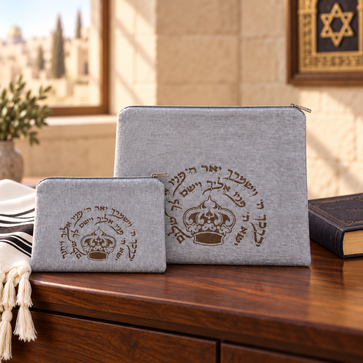 Silver gray laser engraved crown tallit and tefillin bag set with smaller pouch resting in front