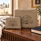 Taupe laser engraved crown tallit and tefillin bag set in a Jewish home setting