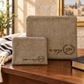 Taupe laser engraved laurel tallit and tefillin bag set in a Jewish home setting