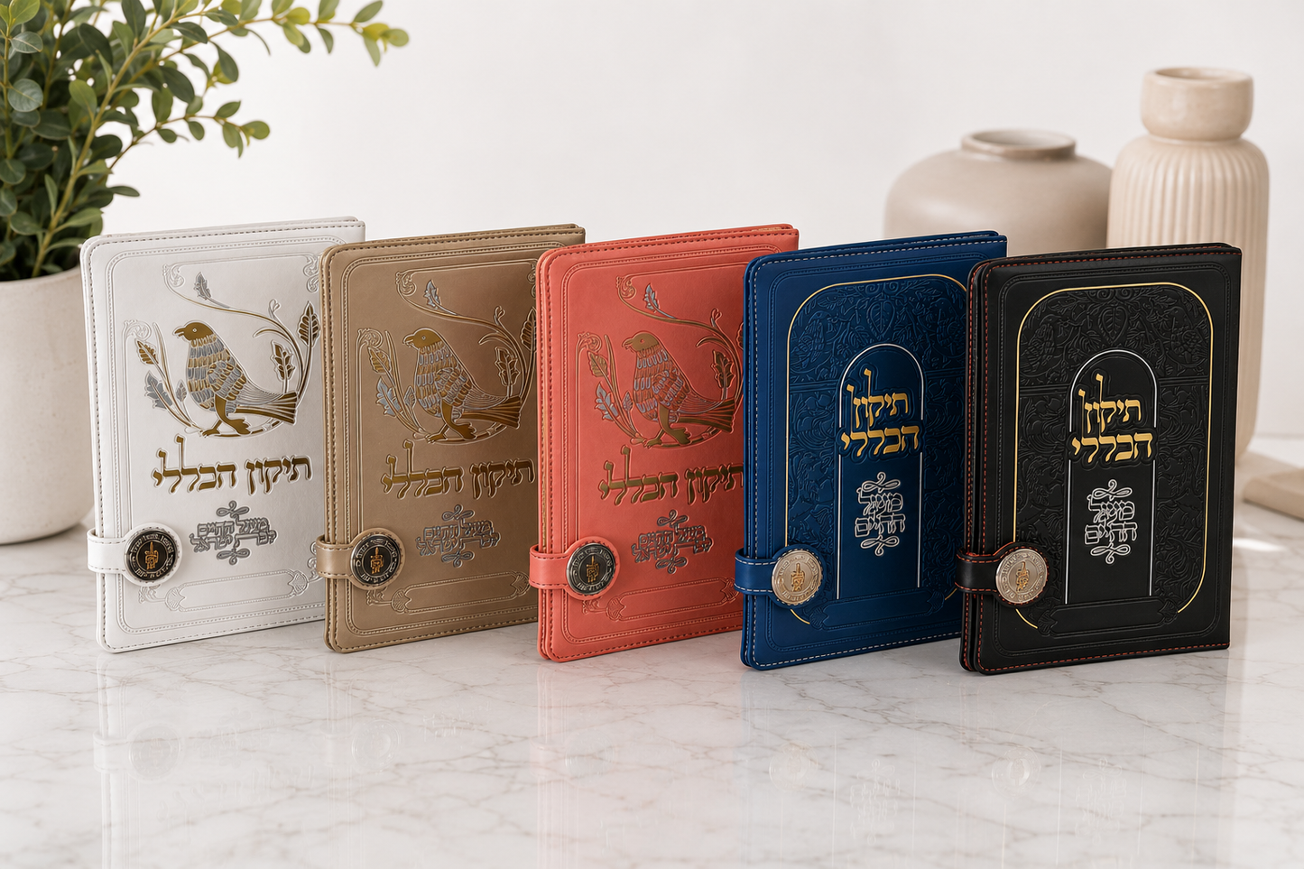 Tikkun Haklali deluxe faux leather prayer books staged on a white countertop