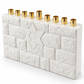 Angled view of the white concrete Star of David menorah showing the brick-pattern front, smooth side, and nine gold-tone candle holders.