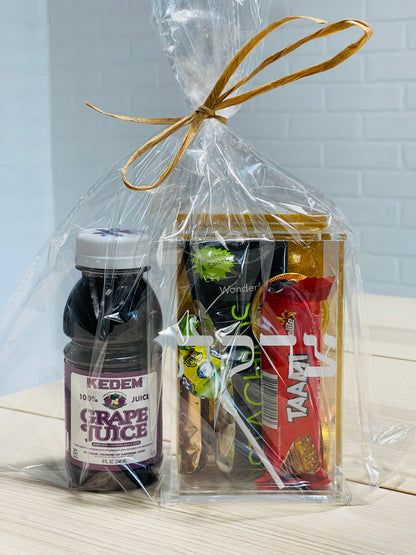 Purim acrylic tzedakah box mishloach manot with candies and grape juice for kiddush