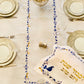 The Blue Bird Tablecloth Embroidered on Pure White Linen. Matching Challah Cover is available